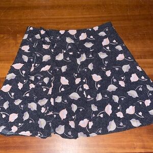 Loft, size 6 black mini skirt with flowers, never worn with tag